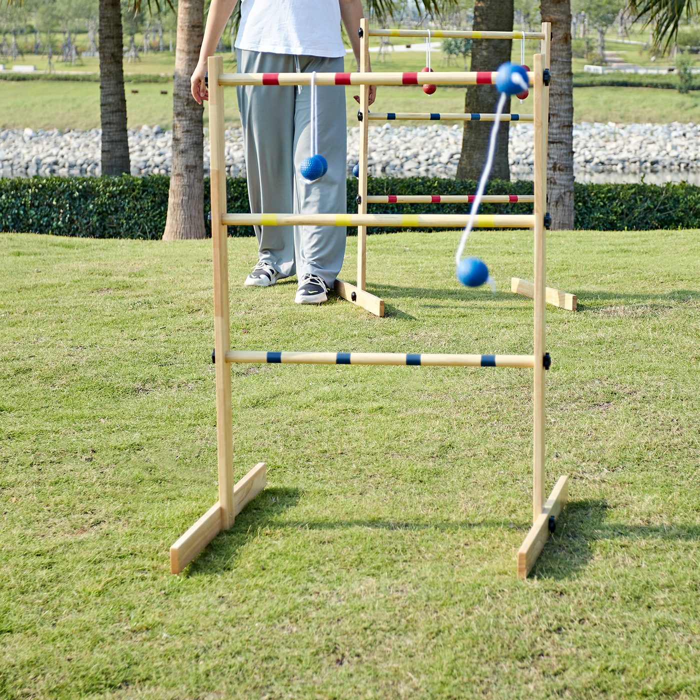 ApudArmis ladder toss set with bolas wrapped on the rungs